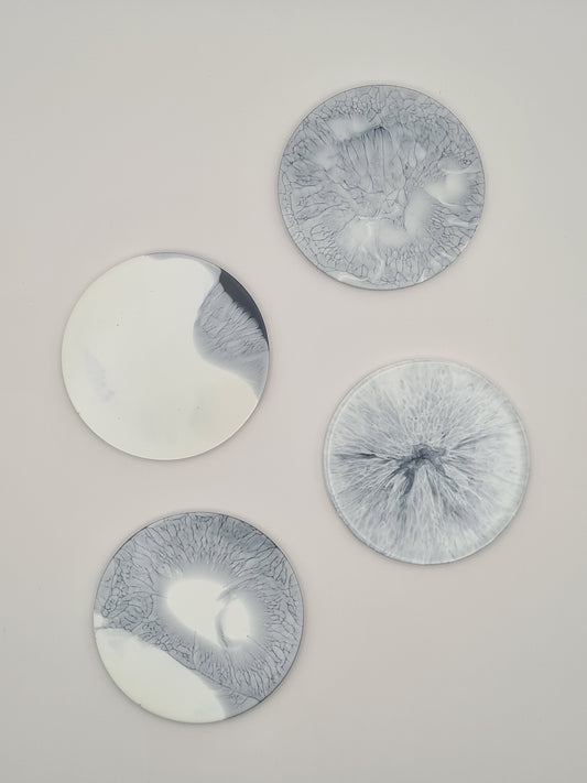 Lot de 4 dessous de verre blanc et bleu rappelant les glaciers